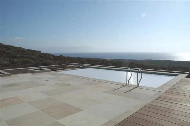 Pool terrace with a timber deck looking out over the Atlantic from Tenerife